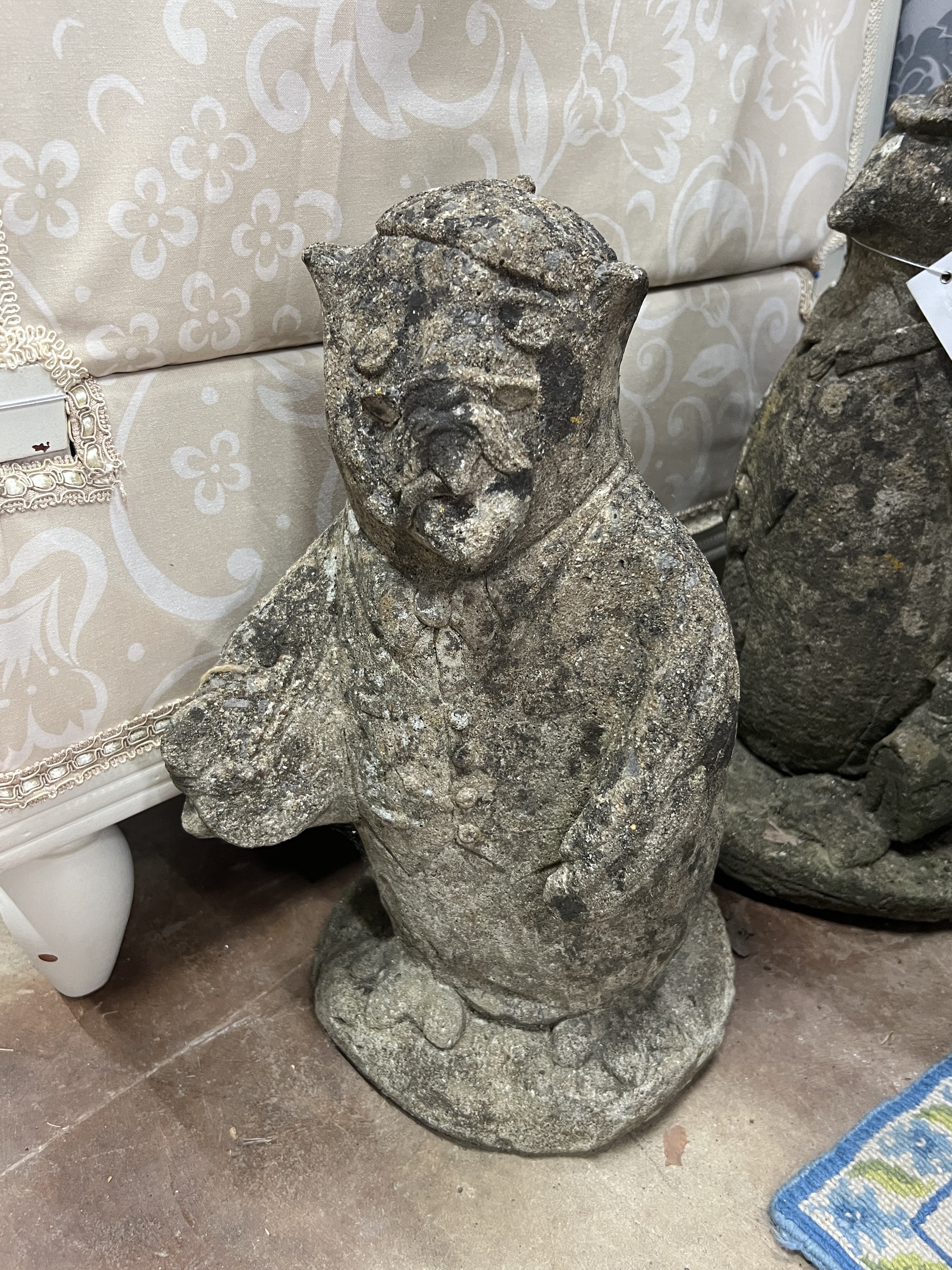 Two reconstituted stone garden ornaments, larger height 44cm